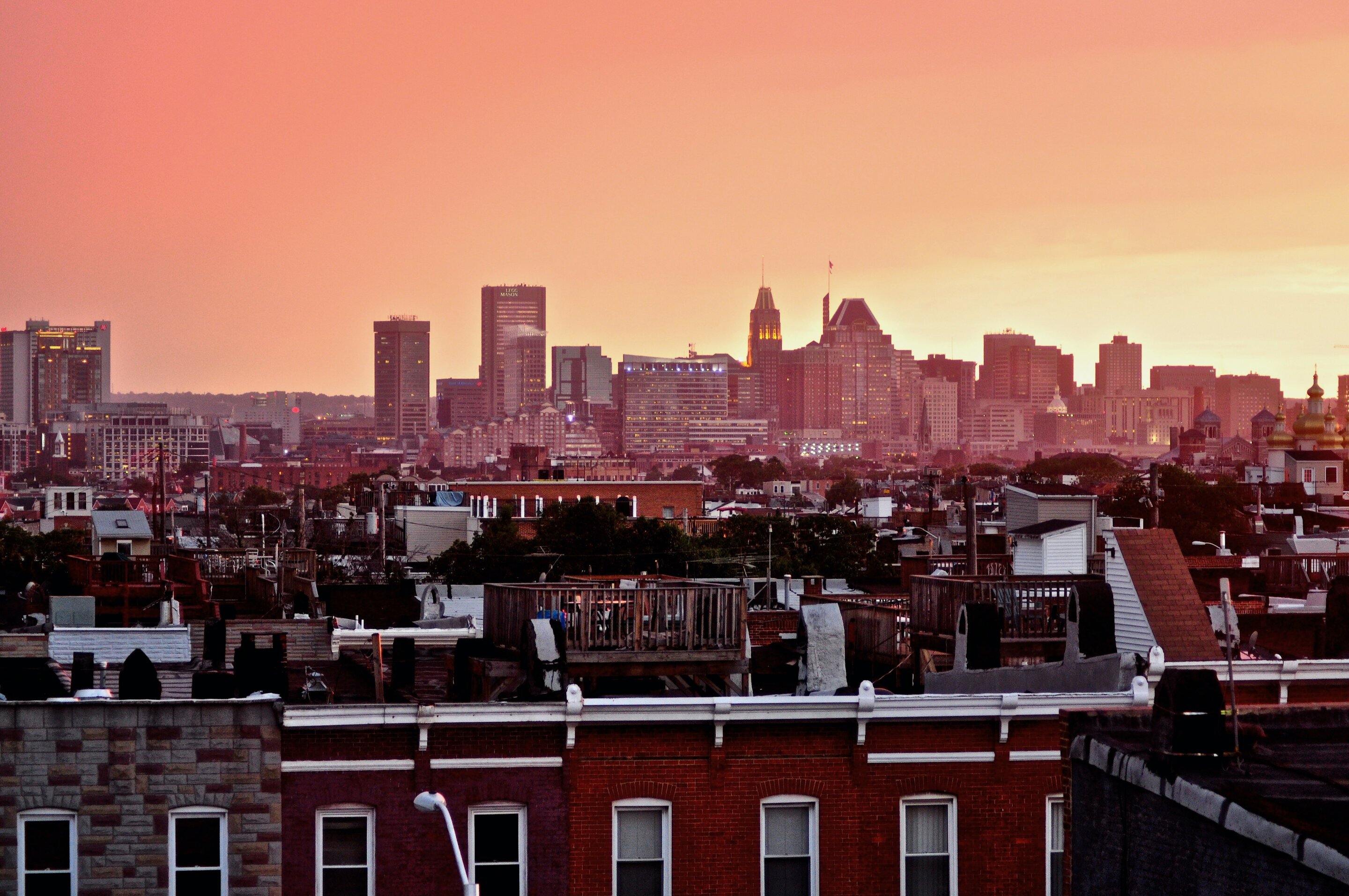 Baltimore skyline behind rowhomes